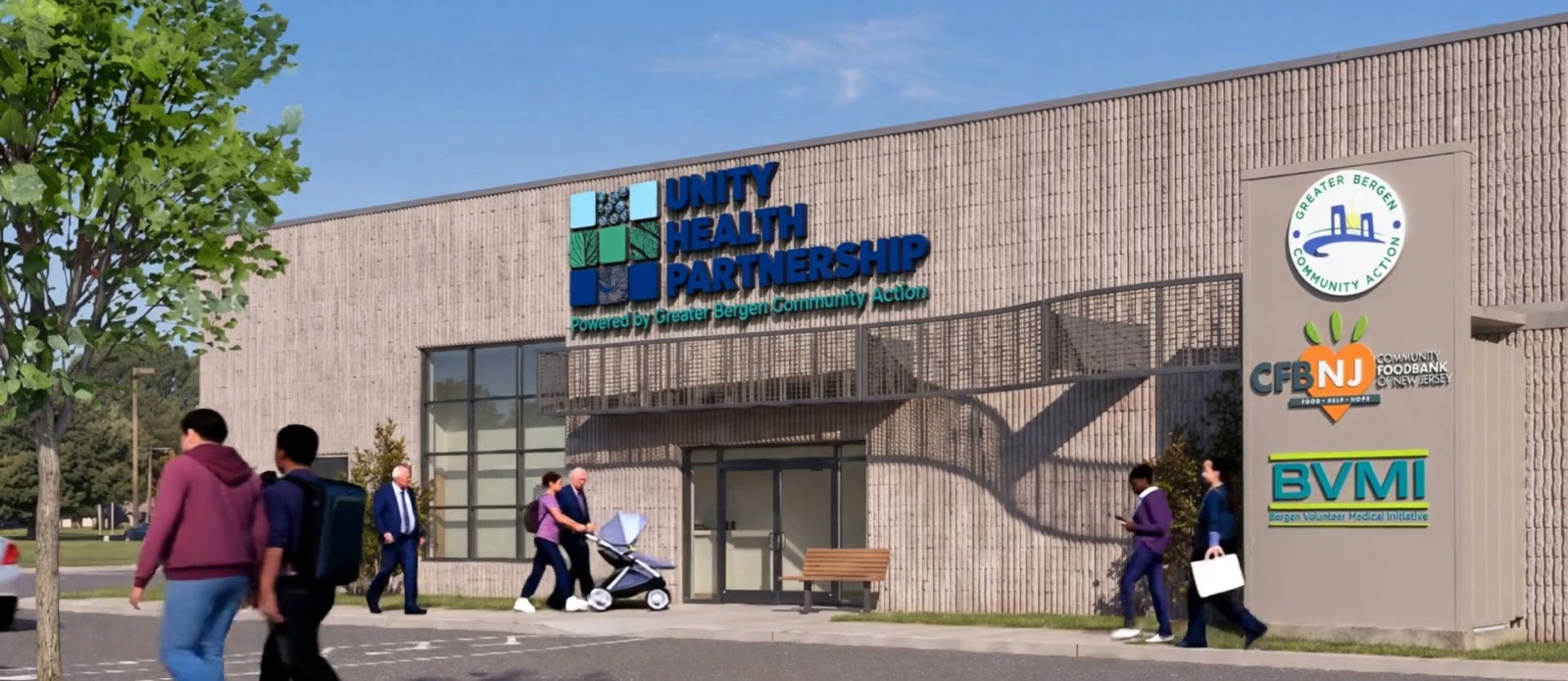 Families arrive at the front entrance of the Unity Health Partnership building at 529 Midland Ave, where the event takes place in the parking lot